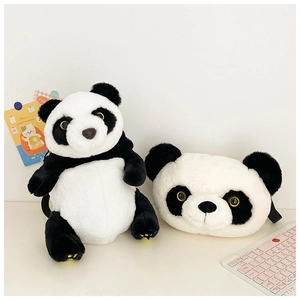 Detail of plush panda backpack and shoulder bag showing soft texture and golden eyes
