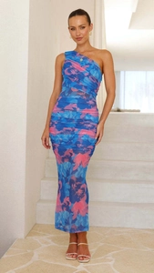 Close-up of ruched mesh fabric and blue floral print on this slim fit one shoulder dress