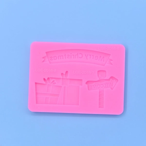 Pink silicone mold for Christmas Merry Christmas ribbon and gift box cake decorating