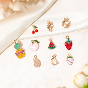 Assorted colorful enamel fruit charms including strawberry and cherry for DIY jewelry making