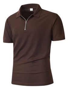 Detail of waffle knit fabric and half-zip collar on men's dark brown sports polo shirt