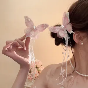 Pink butterfly hair clips with white pearls and long beaded tassels for women