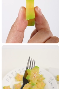 Close-up of flexible PVC starfruit slice model showing realistic texture and soft material