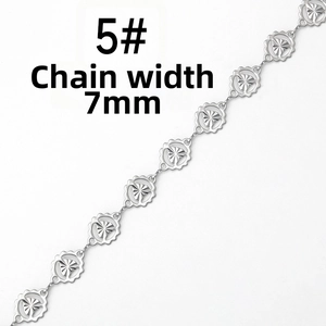 Detailed close-up of 7mm stainless steel chain with hollow floral pattern link style 5#