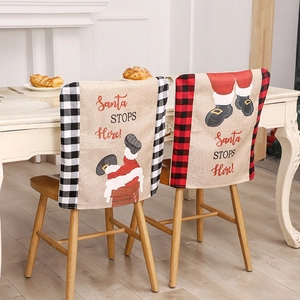 Christmas burlap chair covers with Santa chimney motifs and festive buffalo plaid borders