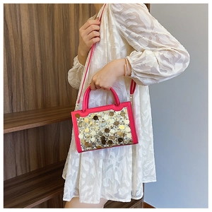 Borsa a mano fucsia con paillettes da donna con dettagli oro e argento e tracolla
