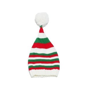 Close-up of red, green, and white striped Christmas knit hat with a soft white faux fur pompom