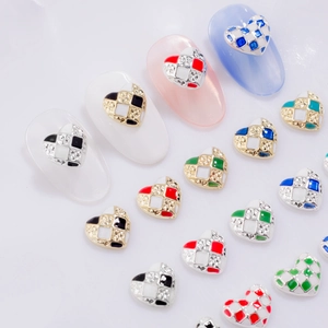Y2K checkered heart nail art charms with colorful oil drip patterns and gold metal frame