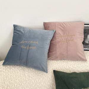 Morandi velvet pillow covers with 'Love rewards the brave' embroidery in assorted colors