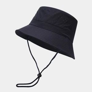 Detail of breathable laser-cut holes and adjustable windproof cord on a black sun hat