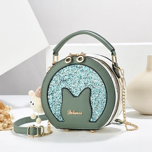 Minimalist round multi-layer crossbody bag with cat ear design and metal chain strap