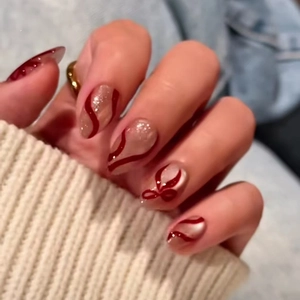 Faux Ongles Noeud Rouge Motif Ondulé Forme Amande Plastique ABS Manucure Douce Élégante Pour Femmes