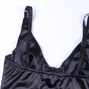 Detail of black satin bodysuit with adjustable thin straps and premium smooth fabric