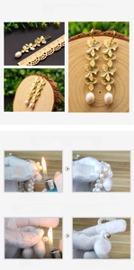 Detail of long floral drop earrings with a large white pearl and 8.5cm measurement scale