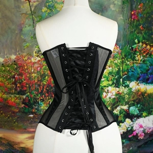 Black boned corset top with mesh and satin patchwork featuring a lace-up back design