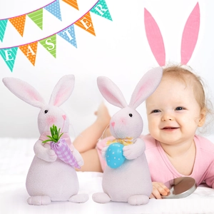 Close-up of plush Easter bunny set with colorful egg and carrot in festive setting