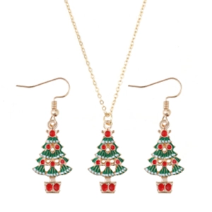 Detail of Christmas tree necklace and earrings set with green enamel and gold finish