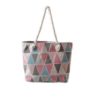 Canvas tote bag with pink and blue geometric pattern and white thick cotton rope handles