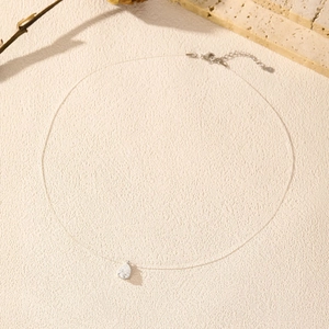 Minimalist S925 silver necklace with pear-shaped moissanite on invisible fishing line