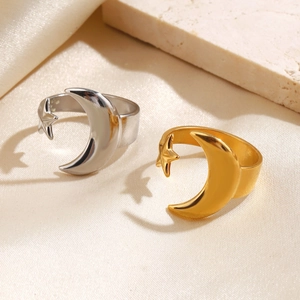 Minimalist adjustable sun and moon rings in gold and silver finish on silk fabric