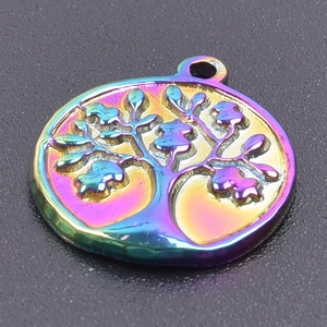 Macro shot of a tree of life pendant in a rainbow metallic finish with top hanging ring