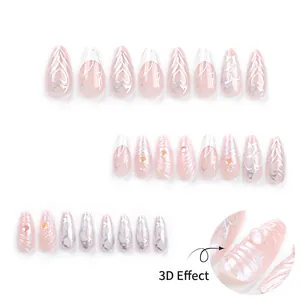 3D water ripple press-on nails with silver heart patterns and amber rhinestones set