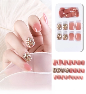 Detailed set of 24pcs pink jelly press-on nails with luxury rhinestones and gems
