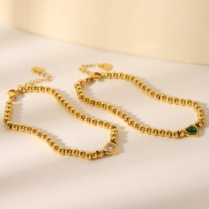 Elegant 18K gold-plated stainless steel beaded bracelets with green and clear heart gems