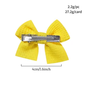 Handmade yellow knit bow hair clip for children with a 4cm metal alligator hair pin
