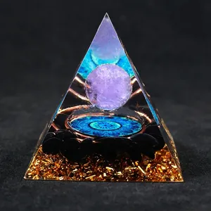Orgonite energy pyramid with amethyst sphere, blue mandala and black obsidian stones
