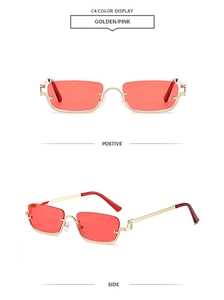 Detail of vintage square semi-rimless sunglasses with gold frame and red tinted lenses