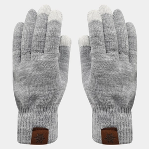 Detail of grey knitted gloves with touchscreen fingertips and snowflake leather patch