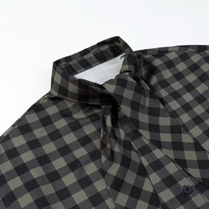 Deep green and black plaid shirt for women featuring a stylish bow-tie neck design