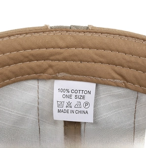 Detailed close-up of 100% cotton inner lining and stitching of a men's flat cap