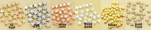 Dettaglio di sei perline metalliche a forma di stella per gioielli DIY in oro, argento e rame