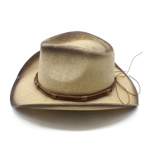 Detail of high-density straw weave with hand-painted gradient finish and leather trim