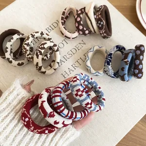 Chouchous En Tricot À Motifs Rétro Élastiques En Tissu Attache Queue De Cheval Doux Confortable Accessoires Cheveux Élégants Pour Femmes