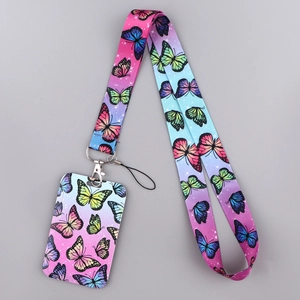 Close-up of butterfly print lanyard and hard shell card holder with gradient colors