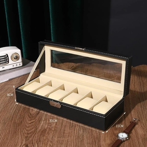 6-slot black faux leather watch box with glass window and beige velvet lining, 30x11x8cm