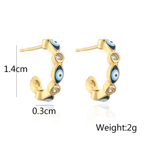 Detail view of gold Evil Eye hoop earrings with 1.4cm height and 2g weight specs