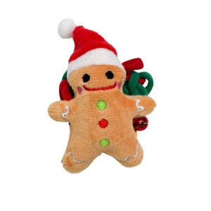 Cute gingerbread man plush hair tie with festive red hat and small jingle bell accessory