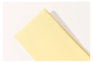 Macro detail of breathable lemon yellow high-density fabric for sports bra
