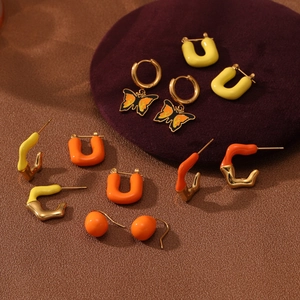 18K gold plated stainless steel earring set featuring butterfly charms and enamel details