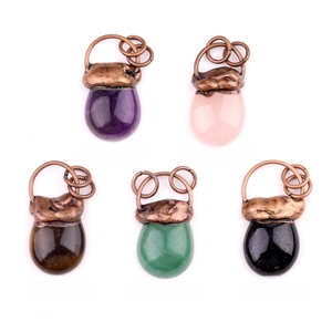 Set of five teardrop gemstone pendants in vintage bronze settings on white background