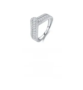 Detail of S925 sterling silver stamp on minimalist emerald cut pavé diamond ring