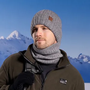 Winter 3-piece set with grey cable knit beanie and neck warmer for outdoor snow sports
