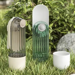Portable pet water bottle with transparent striped cup for dogs in green and beige colors