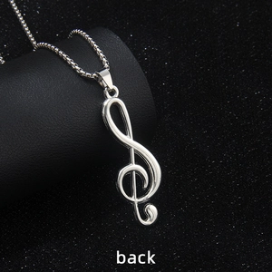 Back view of silver stainless steel treble clef music note necklace on square chain