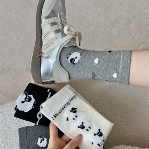 Cozy cotton mid-calf socks for women featuring cute sheep embroidery in neutral colors