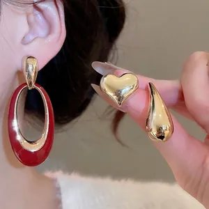 Elegant gold and red enamel geometric pearl earring set with heart and drop studs